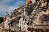 Chiang Mai - The Wat Chedi Luang. The massive chedi heavily damaged by an earthquake. The four staircases are protected by recentely restored guardian naga. 